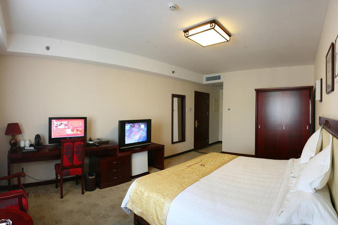 Imagen de la habitación del Hotel Ruyi Business. Foto 9
