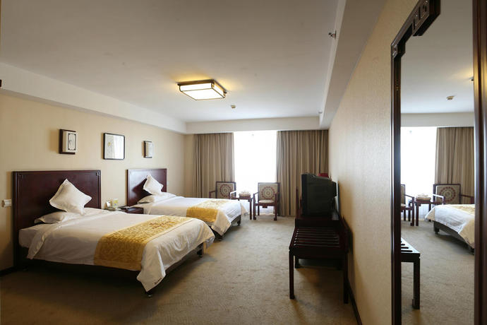 Imagen de la habitación del Hotel Ruyi Business. Foto 10
