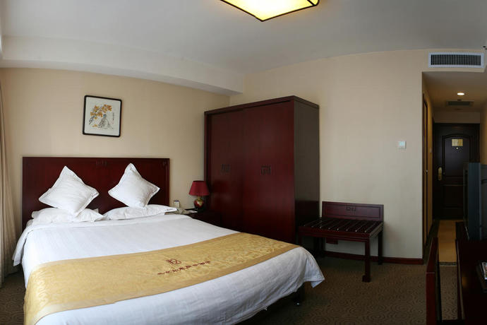 Imagen de la habitación del Hotel Ruyi Business. Foto 11