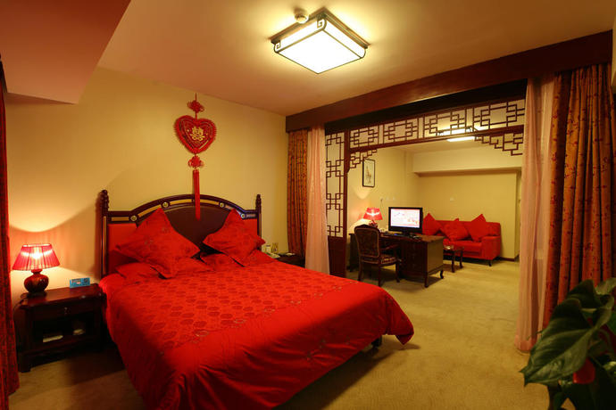 Imagen de la habitación del Hotel Ruyi Business. Foto 12
