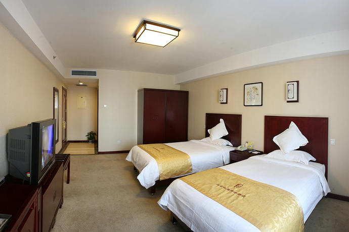 Imagen de la habitación del Hotel Ruyi Business. Foto 13