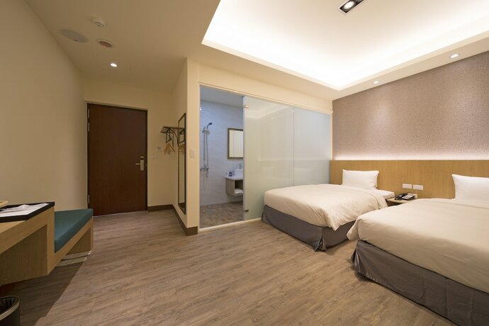 Imagen de la habitación del Hotel Ruyi Inn. Foto 19