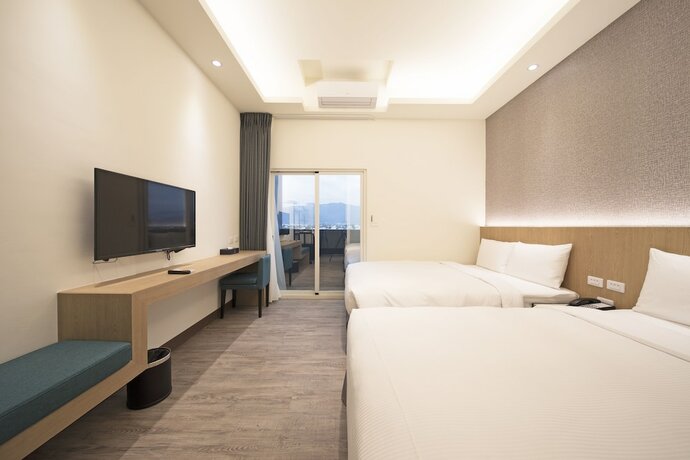 Imagen de la habitación del Hotel Ruyi Inn. Foto 20