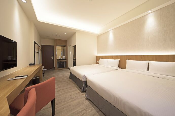 Imagen de la habitación del Hotel Ruyi Inn. Foto 21