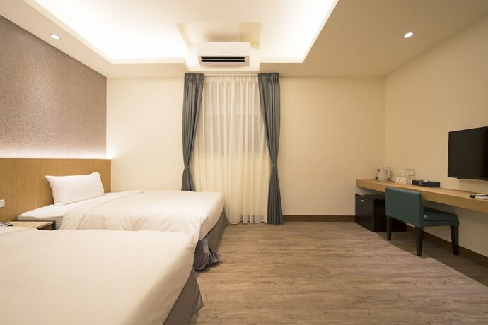 Imagen de la habitación del Hotel Ruyi Inn. Foto 22