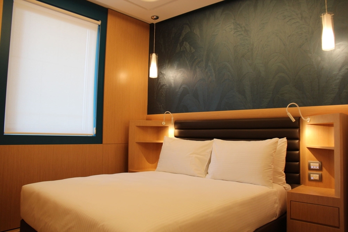 Imagen de la habitación del Hotel Rydges Australia Square. Foto 8