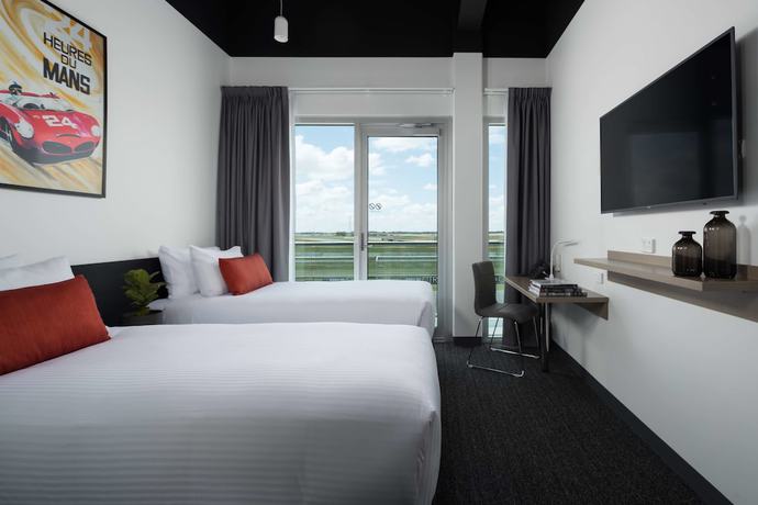 Imagen de la habitación del Hotel Rydges Pit Lane. Foto 10