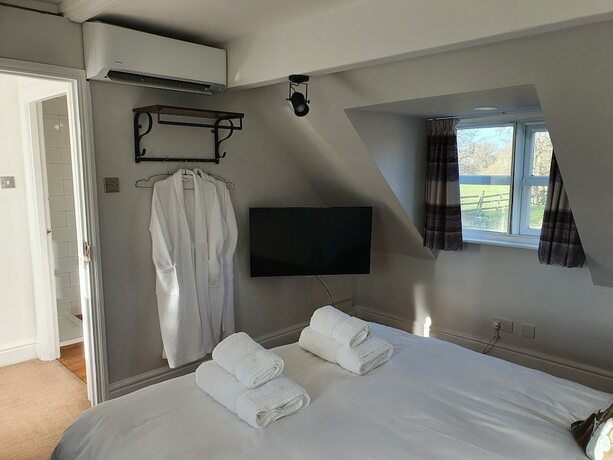 Imagen de la habitación del Hotel Rylands Farmhouse. Foto 15