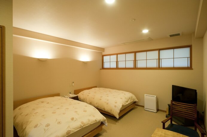Imagen de la habitación del Hotel Ryotei Manyou. Foto 28