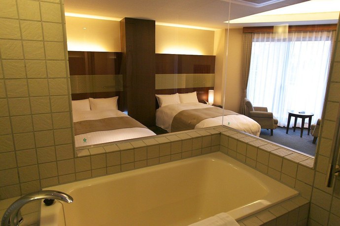 Imagen de la habitación del Hotel Ryotei Matsuya Honkan Suizenji. Foto 11