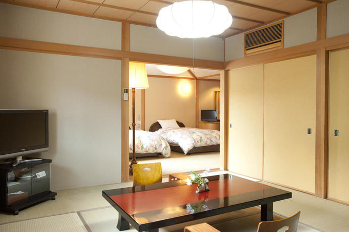 Imagen de la habitación del Hotel Ryotei Tanokura. Foto 2