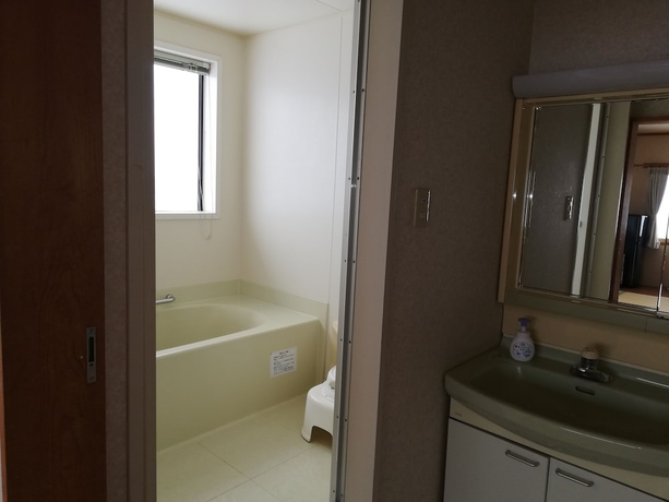 Imagen de la habitación del Hotel Ryounkaku, Kamifurano. Foto 7