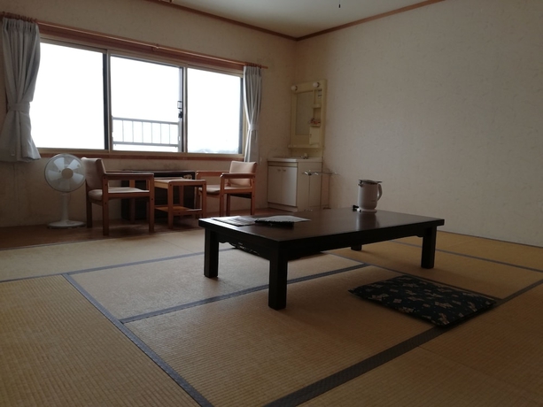 Imagen de la habitación del Hotel Ryounkaku, Kamifurano. Foto 11