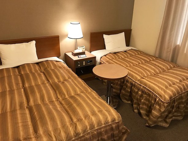 Imagen de la habitación del Hotel Ryugasaki Plaza Shinkan. Foto 11