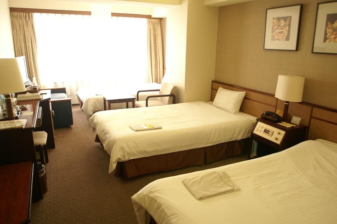 Imagen de la habitación del Hotel Ryukyu Sun Royal. Foto 2