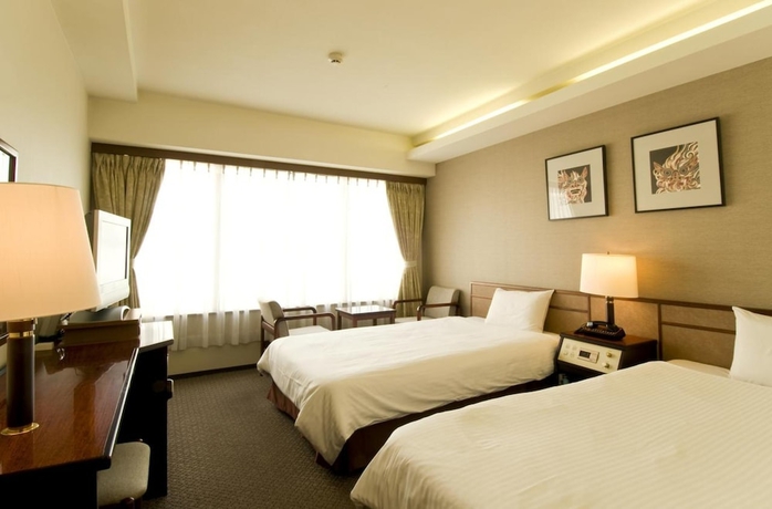 Imagen de la habitación del Hotel Ryukyu Sun Royal. Foto 3