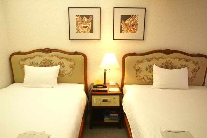 Imagen de la habitación del Hotel Ryukyu Sun Royal. Foto 15