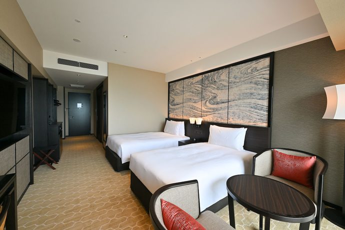 Imagen de la habitación del Hotel Ryukyu and Resort Nashiro Beach. Foto 3