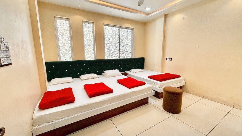 Imagen de la habitación del Hotel S C PALACE near Mahakal Temple. Foto 10