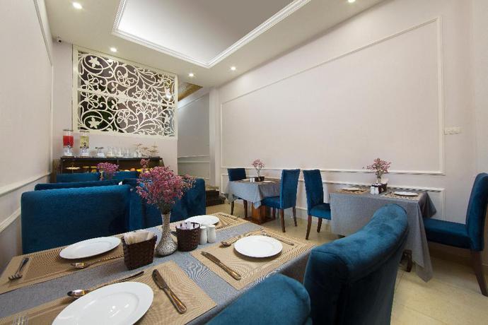 Imagen del bar/restaurante del Hotel S Central and Spa. Foto 4