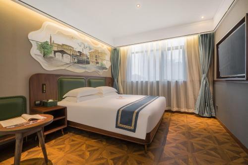 Imagen de la habitación del Hotel 时光漫步S酒店（上海五角场店）. Foto 18