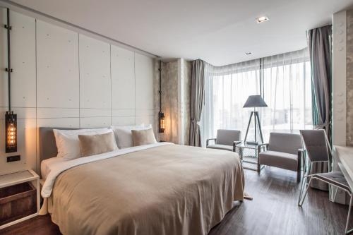 Imagen de la habitación del Hotel S Hadyai. Foto 6