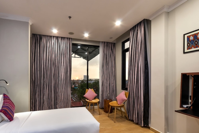 Imagen de la habitación del Hotel S Loft Manado. Foto 8