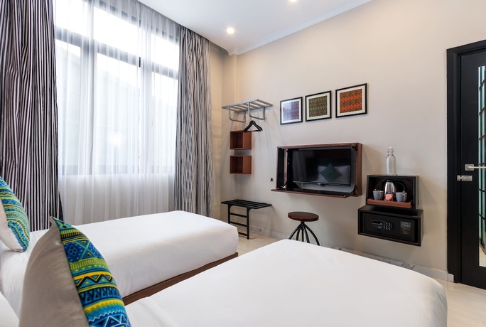 Imagen de la habitación del Hotel S Loft Manado. Foto 9