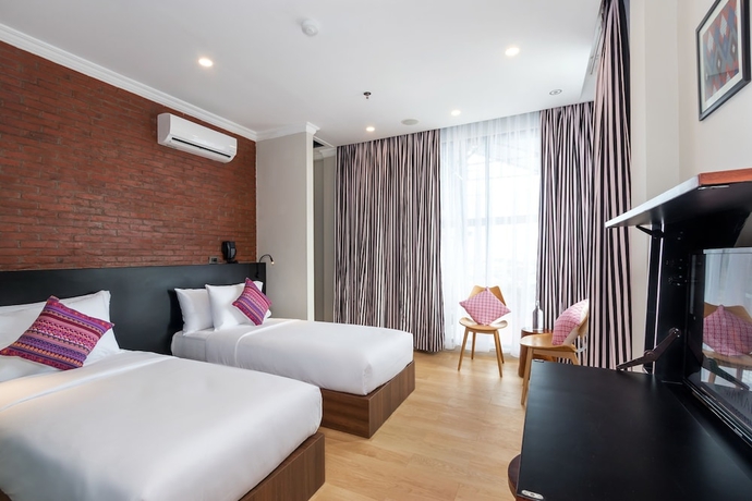 Imagen de la habitación del Hotel S Loft Manado. Foto 10