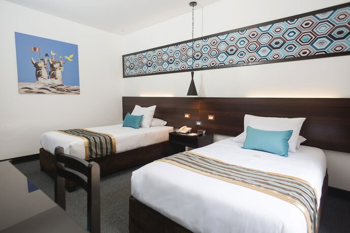 Imagen de la habitación del Hotel SACHA CENTRIC. Foto 19