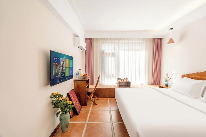 Imagen de la habitación del Hotel SAI JIA HOTEL. Foto 7