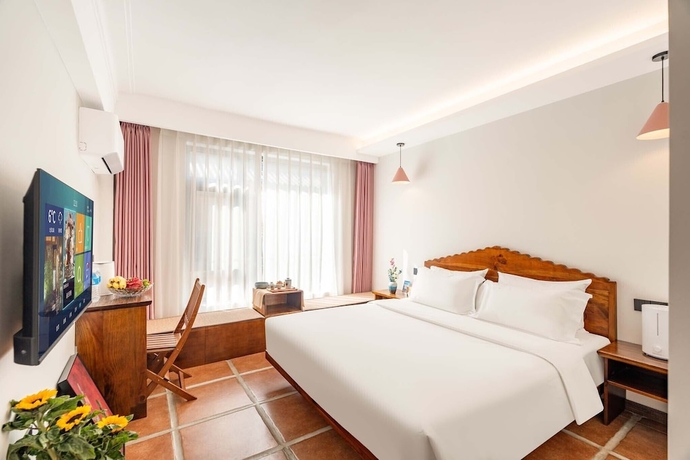 Imagen de la habitación del Hotel SAI JIA HOTEL. Foto 12