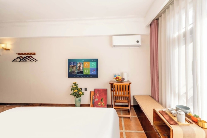 Imagen de la habitación del Hotel SAI JIA HOTEL. Foto 13