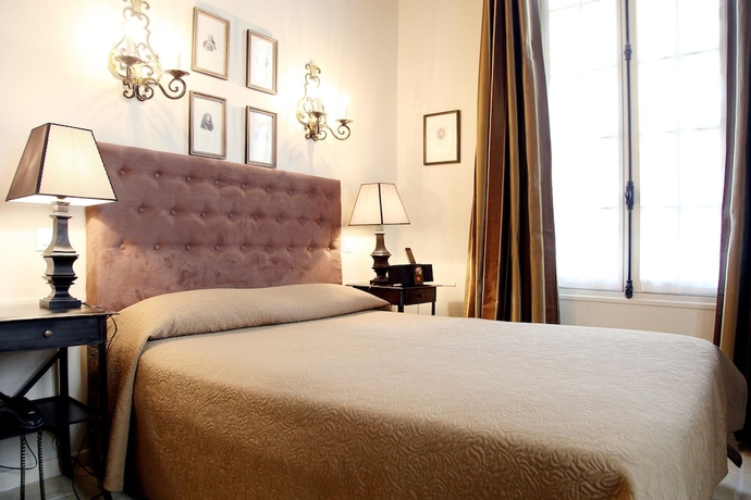 Imagen de la habitación del Hotel SAINT LOUIS EN L'ISLE. Foto 2