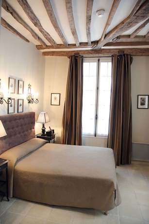 Imagen de la habitación del Hotel SAINT LOUIS EN L'ISLE. Foto 8