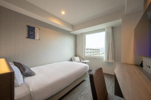 Imagen de la habitación del Hotel SAKURA PORT HOTEL. Foto 12
