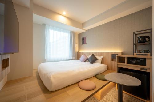 Imagen de la habitación del Hotel SAKURA PORT HOTEL. Foto 13