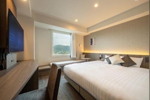Imagen de la habitación del Hotel SAKURA PORT HOTEL. Foto 14