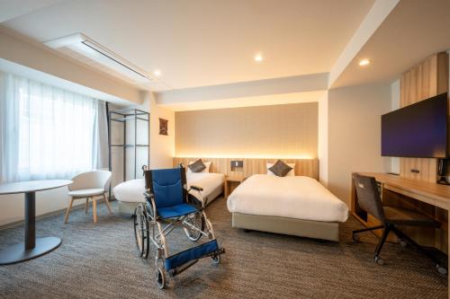 Imagen de la habitación del Hotel SAKURA PORT HOTEL. Foto 19
