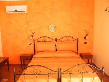 Imagen de la habitación del Hotel SALOTTO DI ATHENA. Foto 3