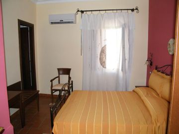 Imagen de la habitación del Hotel SALOTTO DI ATHENA. Foto 7