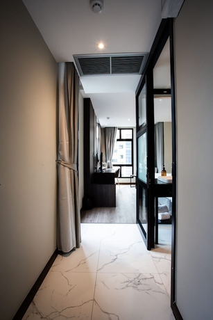 Imagen de la habitación del Hotel SAM E Bangkok Sathorn. Foto 6