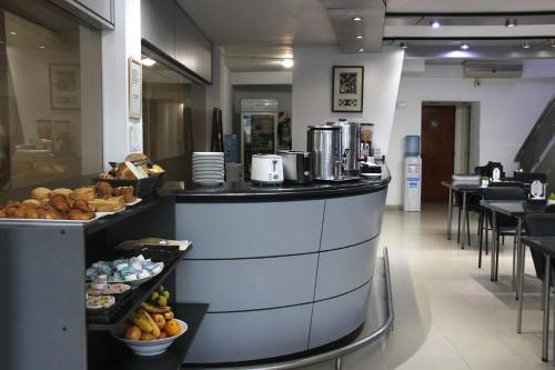 Imagen general del Hotel SAMAR&Aacute;N SUITES. Foto 11