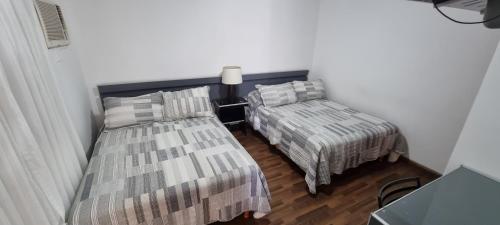 Imagen de la habitación del Hotel SAMAR&Aacute;N SUITES. Foto 20