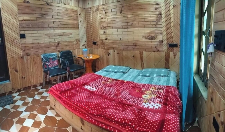 Imagen de la habitación del Hotel SANDEEP HOME STAY. Foto 7