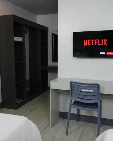 Imagen de la habitación del Hotel SANDS Nasugbu. Foto 17