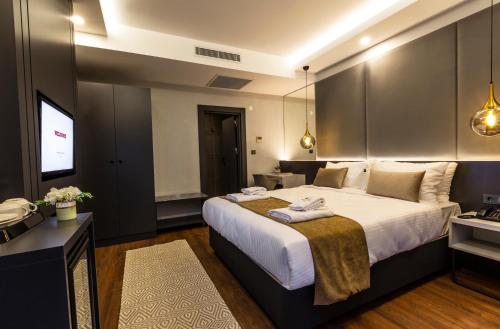 Imagen de la habitación del Hotel SANTANA OTEL. Foto 13