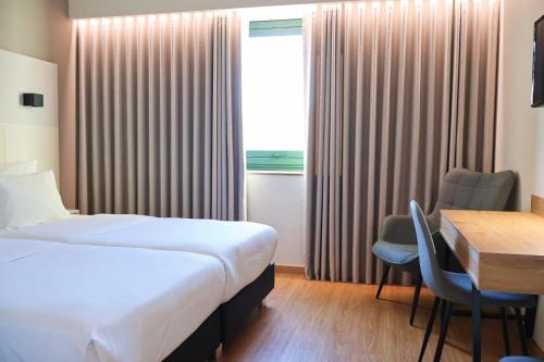 Imagen de la habitación del Hotel SANTHYAGO TROFA. Foto 8