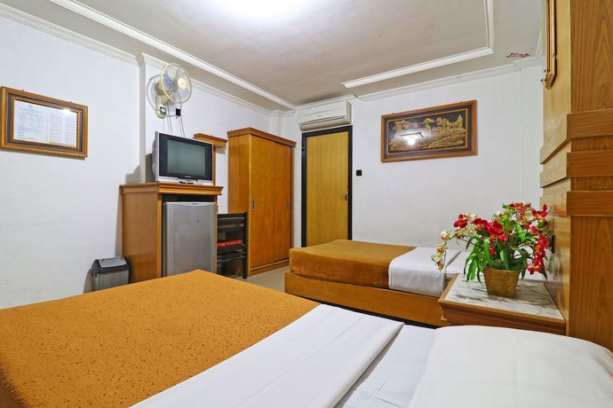 Imagen de la habitación del Hotel SAS Syariah. Foto 12