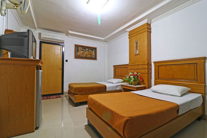 Imagen de la habitación del Hotel SAS Syariah. Foto 17